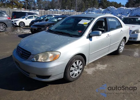 2003 Toyota Corolla Le z USA, uszkodzony, nr VIN JTDBR32E032004096